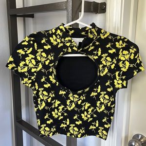 Floral black and yellow crop top from Top Shop. US 2